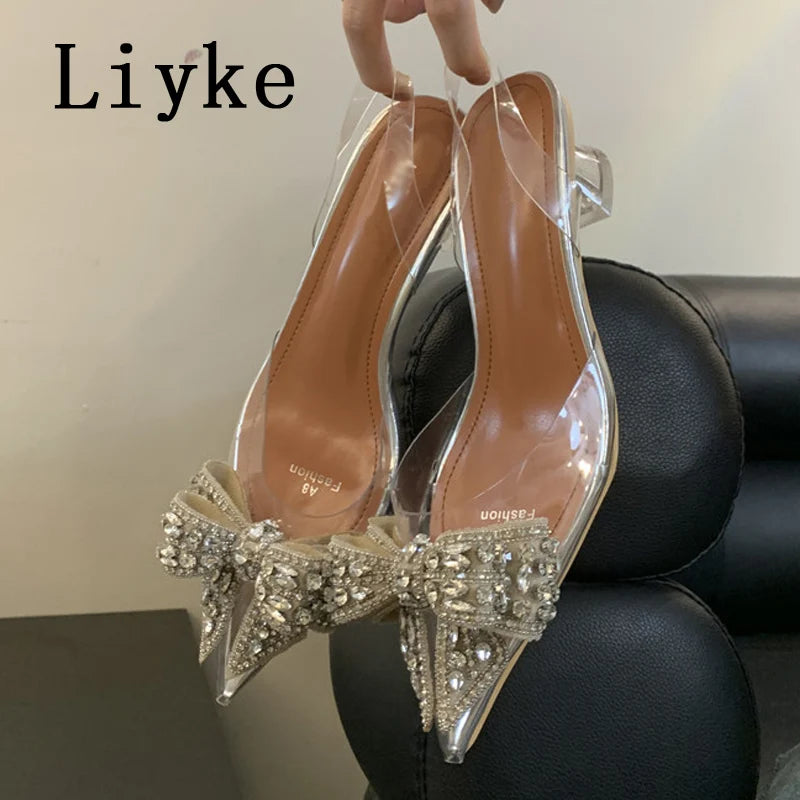 Liyke Fashion Design Crystal Bowknot Women Pumps Sexy Pointed Toe Clear High Heels Wedding Prom Shoes PVC Transparent Sandals