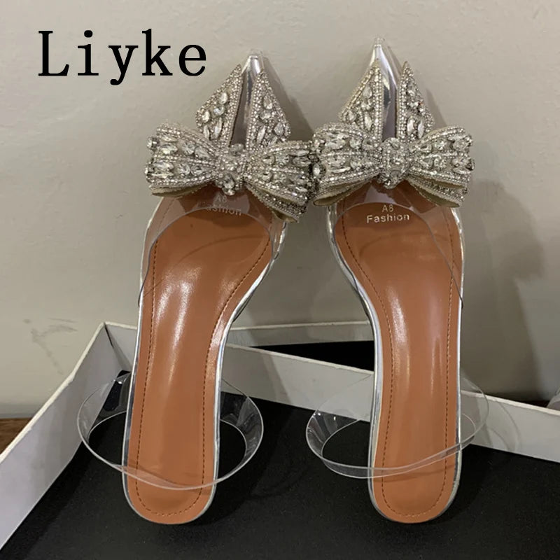 Liyke Fashion Design Crystal Bowknot Women Pumps Sexy Pointed Toe Clear High Heels Wedding Prom Shoes PVC Transparent Sandals